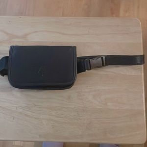 New.Rare genuine dark brown Napa leather five pocket Four Seasons belt bag.